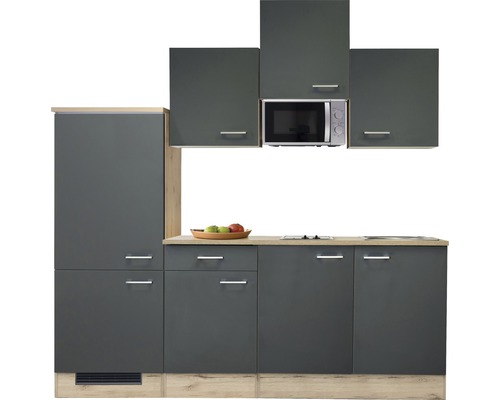 Graue Küchenzeile mit Hängeschränken und Mikrowelle