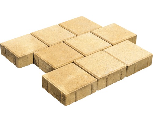 Pavés carrés en béton, posés selon un motif