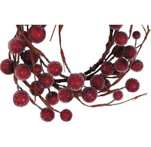 Couronne décorative avec des baies rouges pour décorations festives