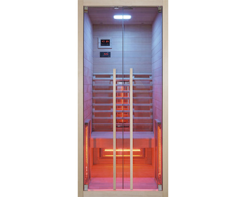 Vue intérieure d''un sauna infrarouge avec bancs en bois et porte en verre