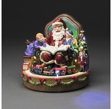 Weihnachtsdekoration mit Weihnachtsmann, Kindern, Nussknacker und Eisenbahn