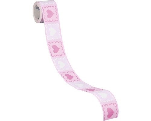 Rouleau de ruban cadeau avec motifs de cœurs