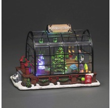 Dekorative Blumenladen-Miniatur mit Figuren und Gewächshaus