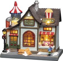 Beleuchtetes Popcornfabrik-Weihnachtsdekorationsgebäude mit Figuren und Details wie einem Popcornturm