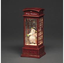 Boule à neige dans une cabine téléphonique avec figurine de bonhomme de neige