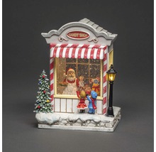Weihnachtsdekoration: Süsswarenladen mit Weihnachtsmann und Kindern