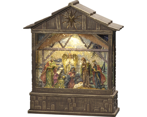 Crèche de Noël avec des personnages dans une étable