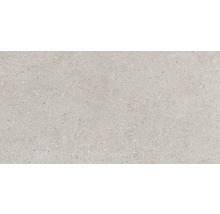 Helle Bodenfliese mit gesprenkelter Oberfläche