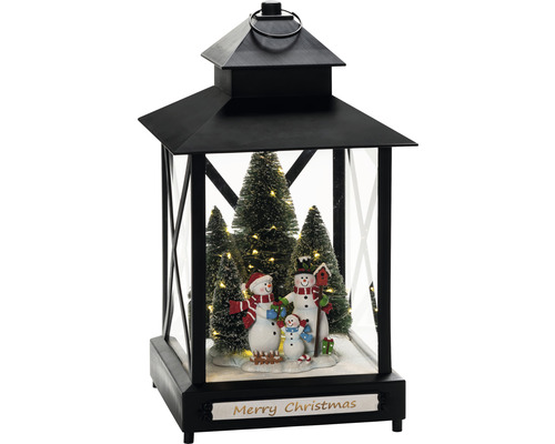Lanterne décorative avec famille de bonhommes de neige et sapins