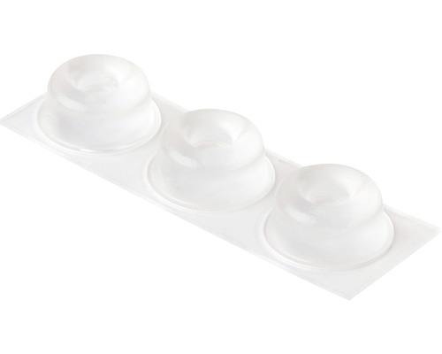 Trois amortisseurs de meubles transparents sur une carte en plastique