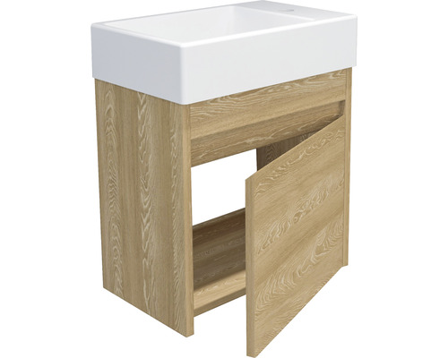 Meuble sous-lavabo avec porte ouverte et lavabo en céramique