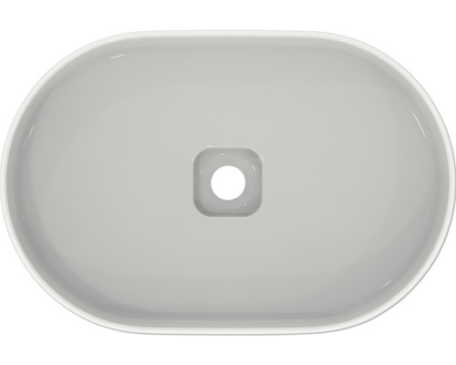 Aufsicht auf ein ovales Waschbecken aus Keramik mit quadratischem Abfluss