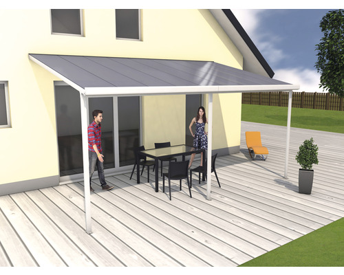 Toit de terrasse avec table et chaises sur une terrasse en bois