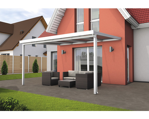 Toit de terrasse en aluminium avec coin salon dans le jardin
