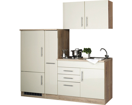 Cuisine intégrée avec placards, évier, plaque de cuisson et tiroirs