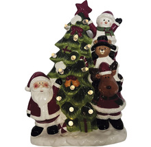 Figurine de Noël décorative avec Père Noël, bonhomme de neige, ours en peluche, renne et sapin de Noël illuminé.
