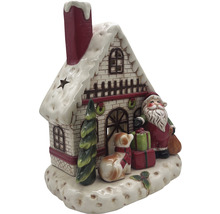 Maison de Noël décorative en céramique avec Père Noël, chien et cadeaux