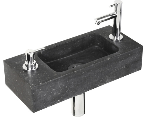 Waschtisch aus Stein mit Armatur und Seifenspender