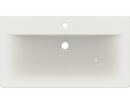 Aufsicht auf ein rechteckiges Keramikwaschbecken mit Hahnloch und Überlauf