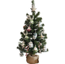 Dekorierter künstlicher Weihnachtsbaum im Jutesack
