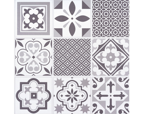 Fliesenmuster mit verschiedenen geometrischen und floralen Motiven