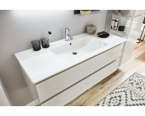 Meuble sous-lavabo avec lavabo à poser et deux tiroirs dans la salle de bains.