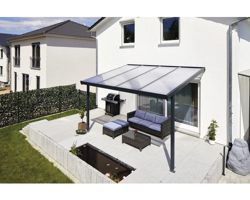 Terrasse avec toit de terrasse, coin salon et barbecue
