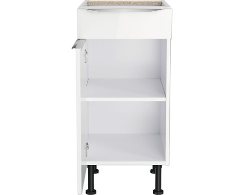 Meuble bas de cuisine blanc avec une porte ouverte et deux étagères