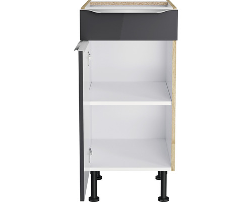 Meuble bas de cuisine avec tiroir, porte ouverte et étagères