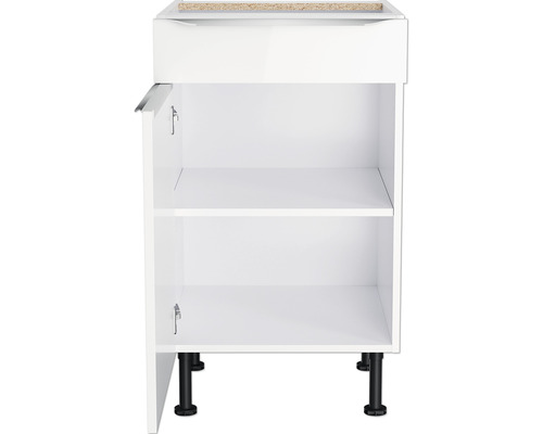 Meuble bas blanc avec porte ouverte et deux étagères