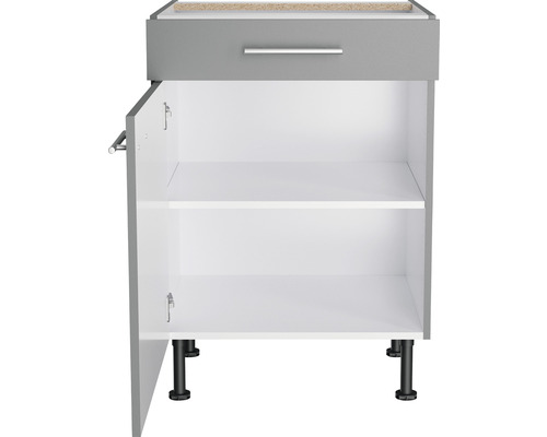 Meuble bas avec tiroir, porte ouverte et étagères