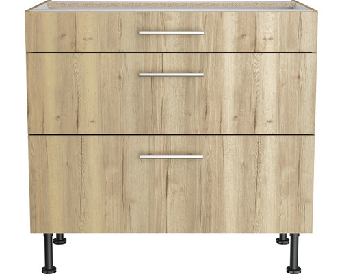 Meuble bas avec trois tiroirs et poignées métalliques