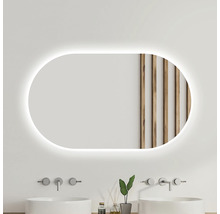 Miroir ovale avec éclairage LED dans une salle de bain