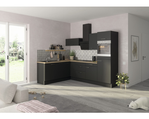 Cuisine moderne avec armoires noires, plan de travail imitation bois et crédence en carreaux
