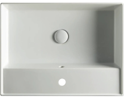 Vue de dessus d''un lavabo rectangulaire en céramique avec garniture d''écoulement