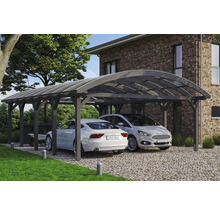 Double carport en bois avec deux voitures devant une maison