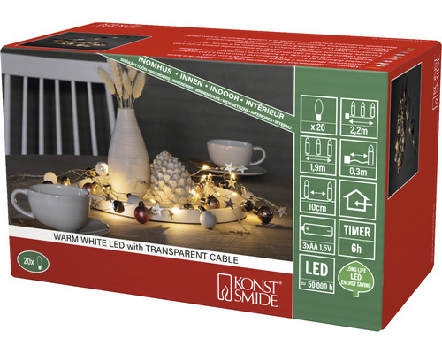 Emballage d''une guirlande lumineuse avec des LED blanc chaud et un câble transparent pour l''intérieur