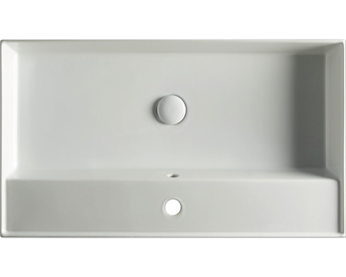 Vue de dessus d''un lavabo rectangulaire en céramique avec bouchon de vidange