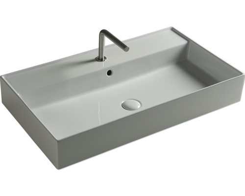 Vasque rectangulaire en céramique avec robinet