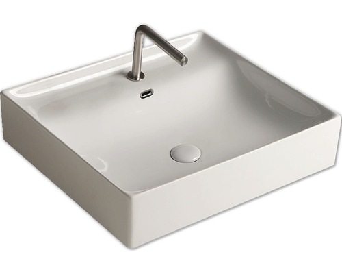 Vasque à poser en céramique avec robinetterie