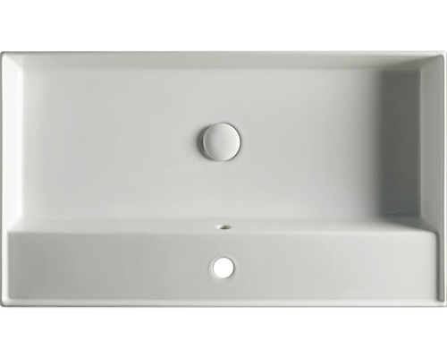 Vue de dessus d''un lavabo rectangulaire avec trou de robinet et trop-plein