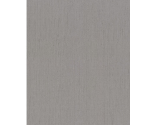 Papier peint intissé 746068 Indian Style uni gris Gros plan d''une surface en bois gris.
