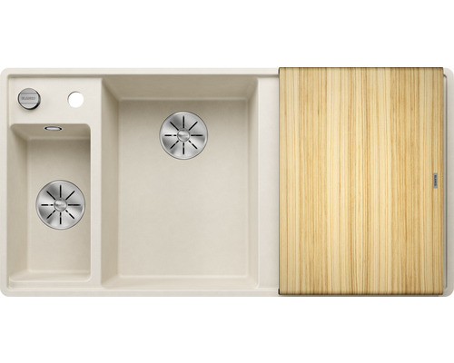 Beige Küchenspüle mit Abtropffläche und Holzschneidebrett