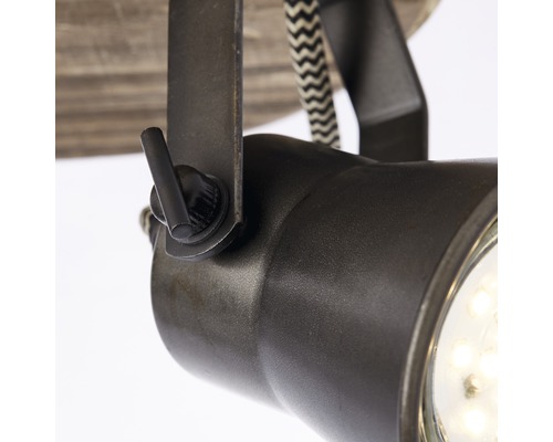 Detailaufnahme einer Deckenleuchte mit verstellbarem Spot