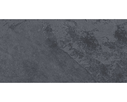 Gros plan d''une ardoise à la texture rugueuse.