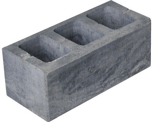 Bloc de béton gris avec trois trous