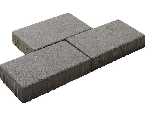 Quatre pavés gris en béton