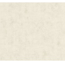 Cremefarbene Strukturtapete für Innenräume.