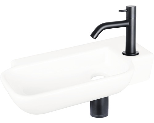 Keramikwaschbecken mit schwarzer Armatur und Ablaufgarnitur