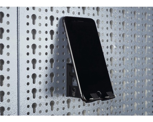 Support de téléphone sur un panneau perforé avec téléphone portable